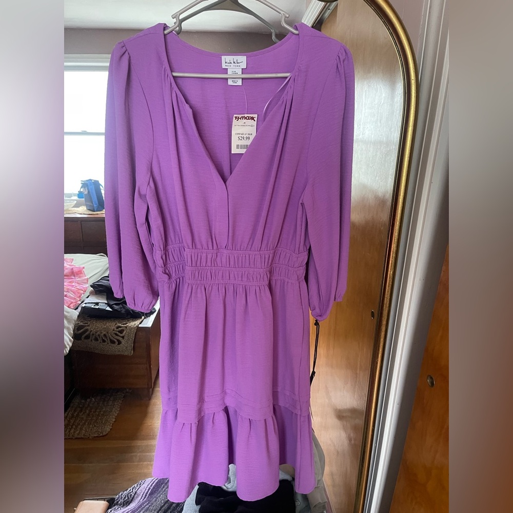 Purple Nicole Miller dress
Size M